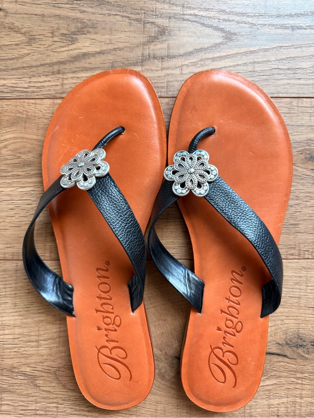 Brighton Black-Strap Sandals with Orange Footbeds and Silver Floral Accents